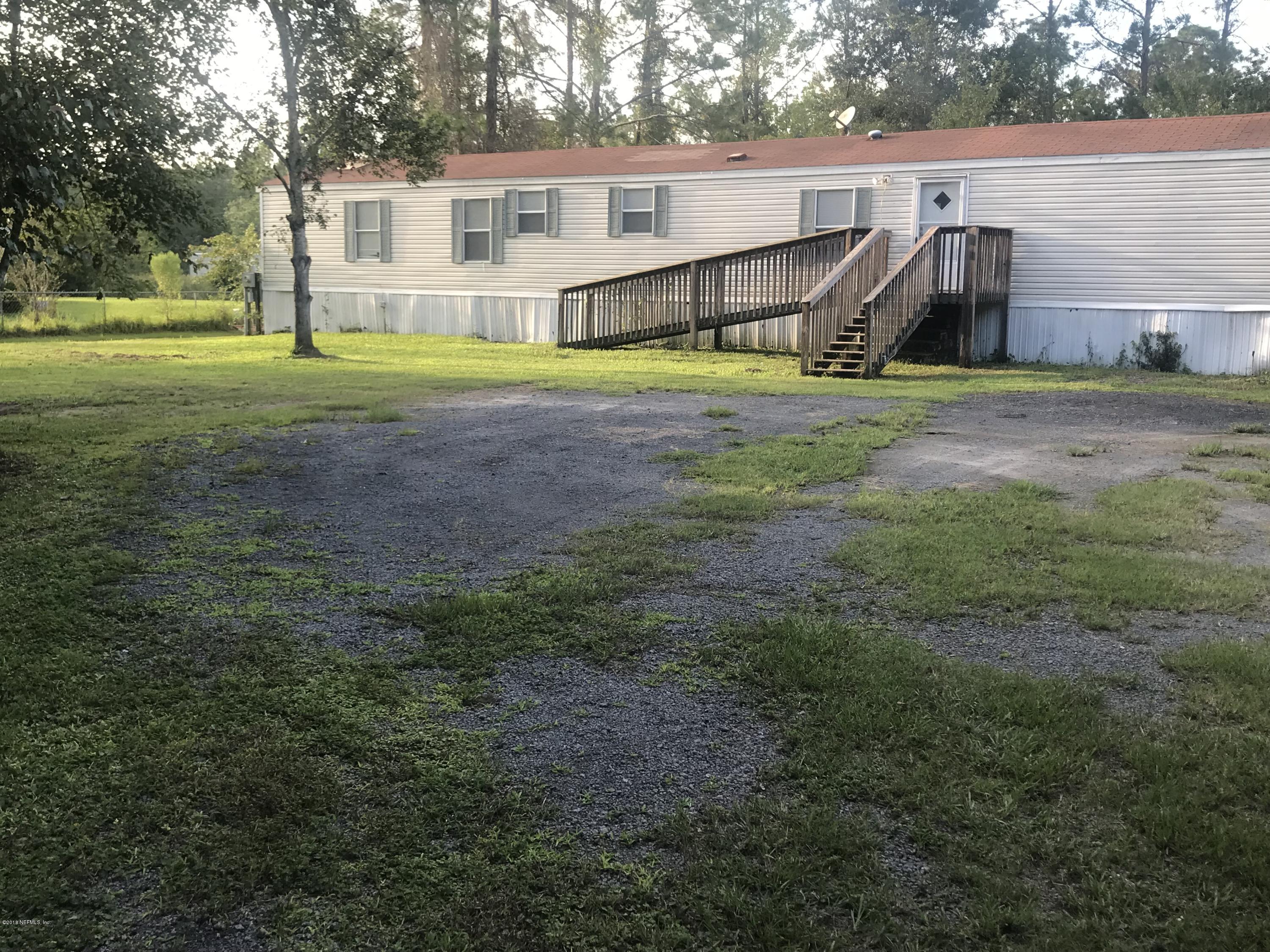10911 Orbey Rhoden Road Glen St. Mary, FL 32040 - Photo 2 of 8 Front View 2