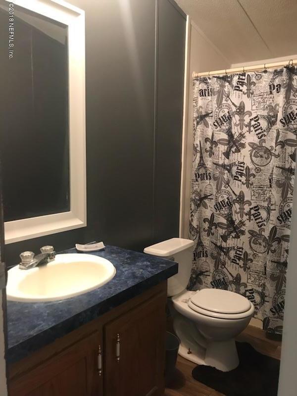 10911 Orbey Rhoden Road Glen St. Mary, FL 32040 - Photo 8 of 8 Guest Bath