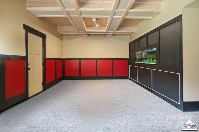 a bedroom with a bed and a mirror