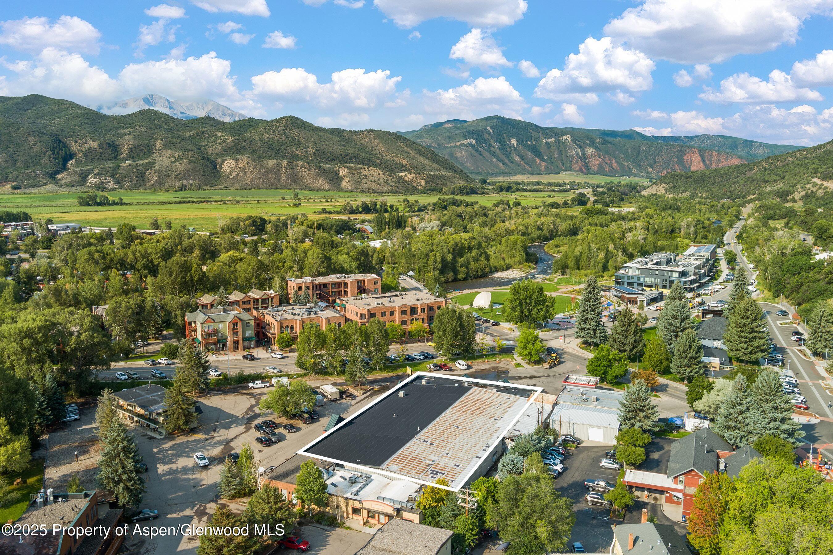 140 Basalt Center Circle, Unit 232 Basalt, CO 81621 - Photo 16 of 17 a view of a city with mountains