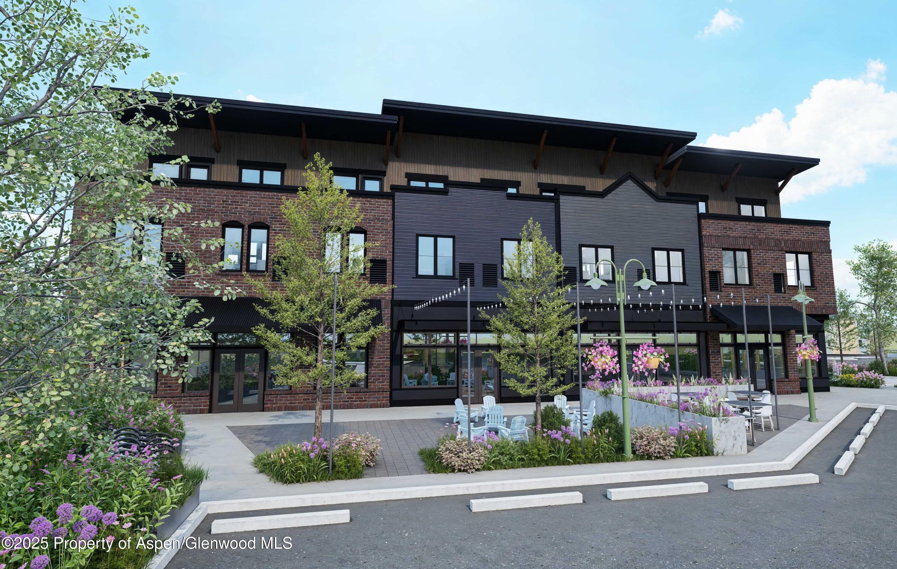 140 Basalt Center Circle, Unit 232 Basalt, CO 81621 - Photo 4 of 17 a view of a chairs and tables in the patio