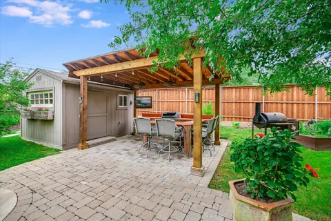 a garden view with a seating space