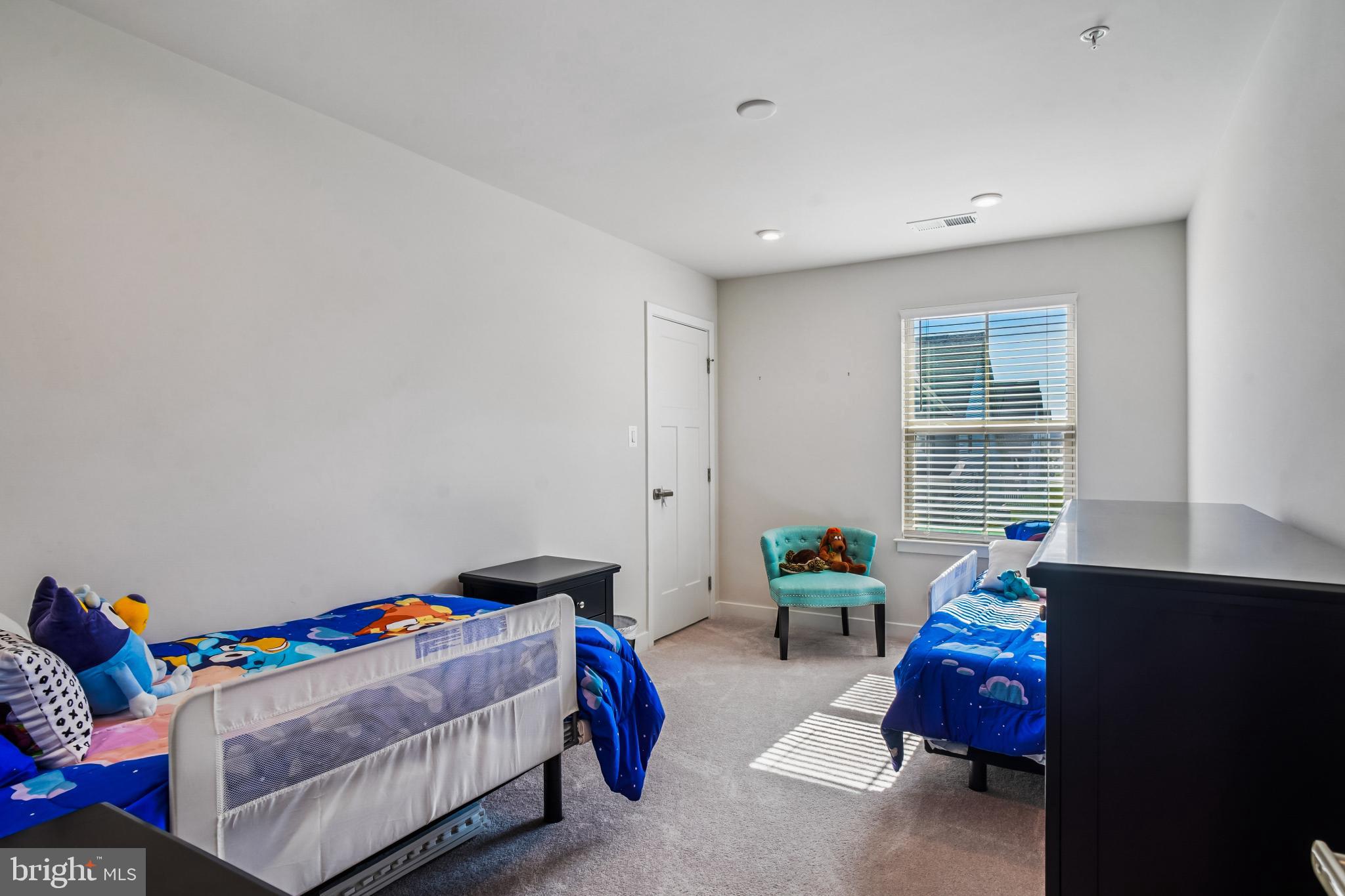 6126 Dock Street Frederick, MD 21703 - Photo 20 of 30 a bedroom with furniture and a window