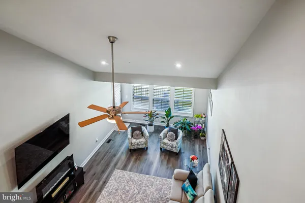 a very nice looking room with a big bed and a flat screen tv