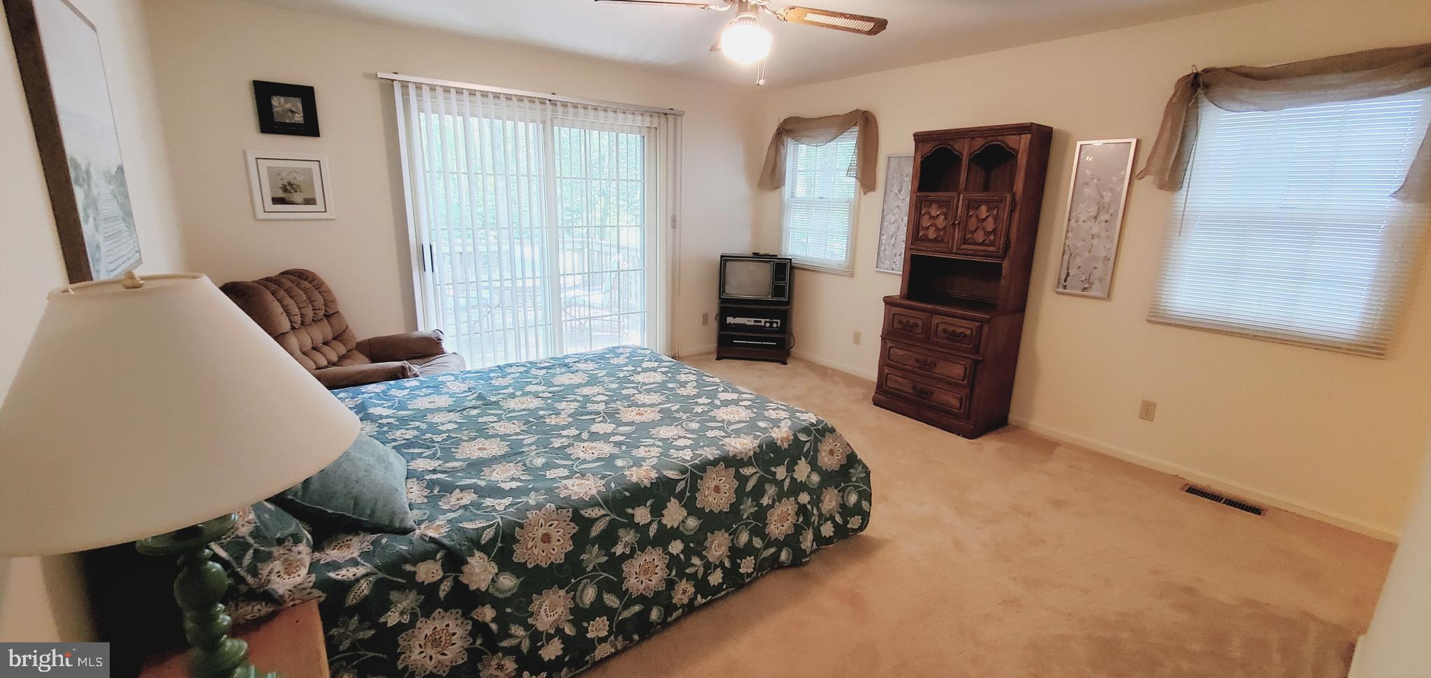 12 Gloucester Road Berlin, MD 21811 - Photo 20 of 29 Primary BR with Sliders to Deck