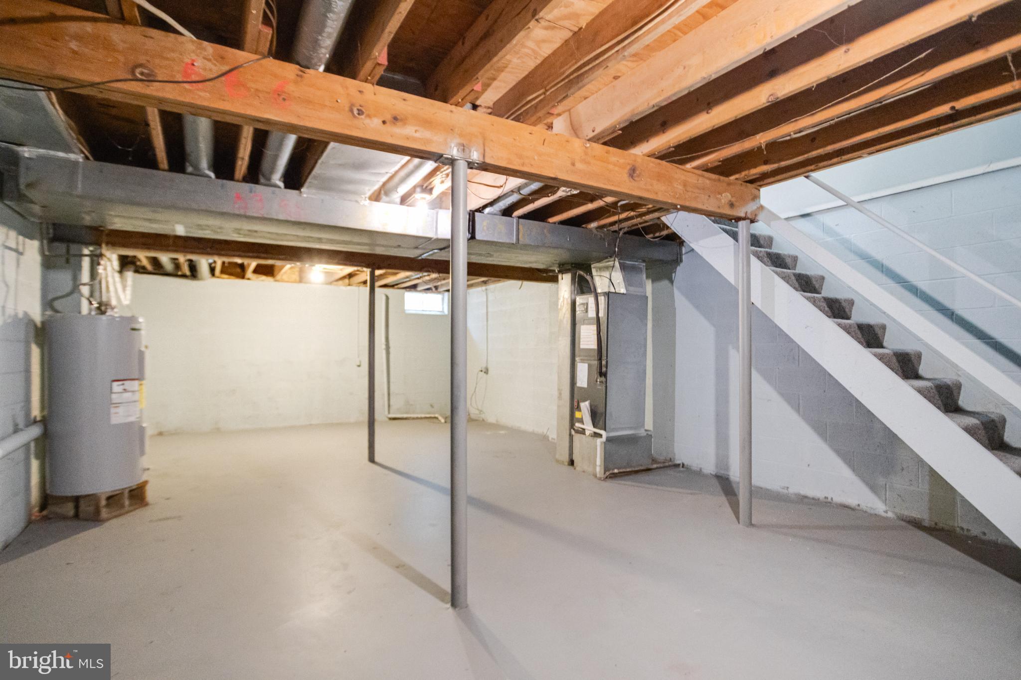 182 East Village Road Elkton, MD 21921 - Photo 36 of 42 Spacious basement with exposed beams.