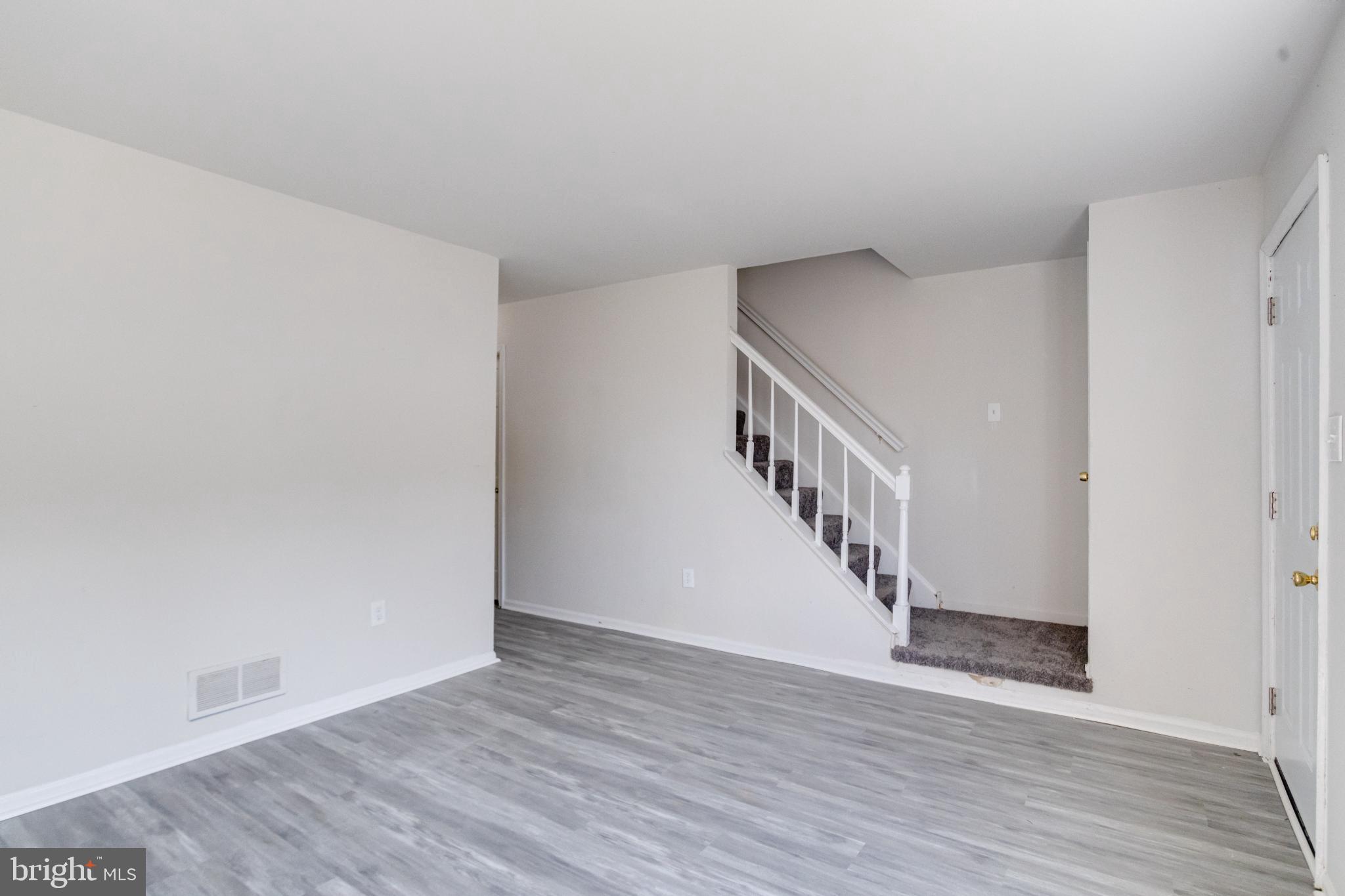 Spacious, light-filled entryway awaits you.