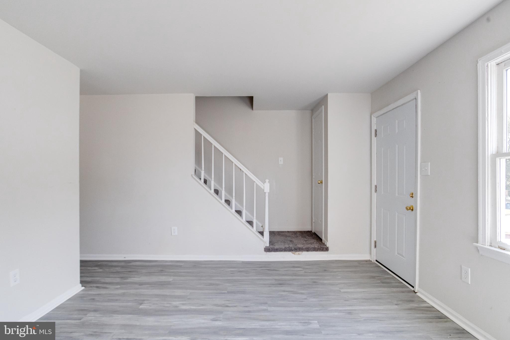 Bright and airy entryway with modern charm.