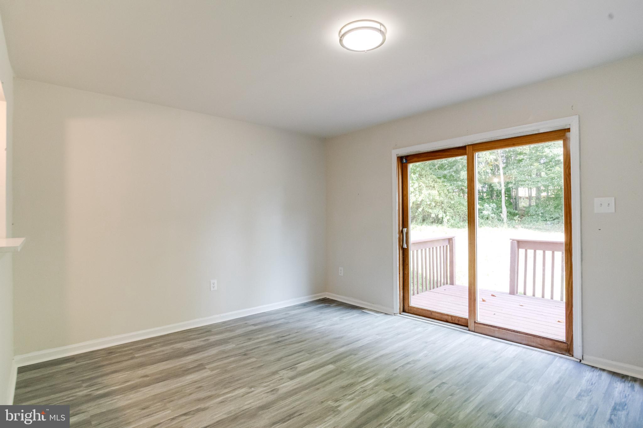 182 East Village Road Elkton, MD 21921 - Photo 10 of 42 Bright and airy space with outdoor access.