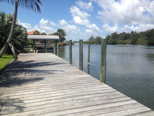 1081 Bali Road Cocoa Beach, FL 32931 - Photo 17 of 17 a view of a backyard of the house