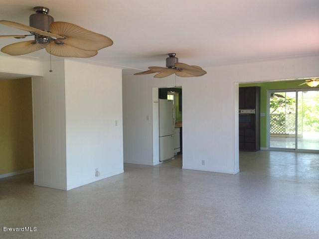 1081 Bali Road Cocoa Beach, FL 32931 - Photo 4 of 17 a view of a hallway with a window