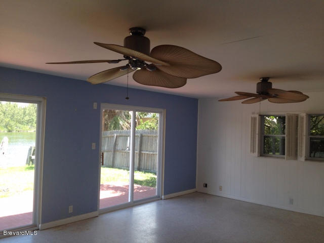 1081 Bali Road Cocoa Beach, FL 32931 - Photo 5 of 17 a view of an empty room and a window