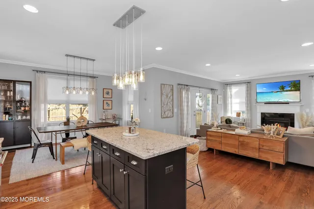 a view of a kitchen and dining room