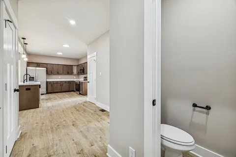 a bathroom with a sink and toilet