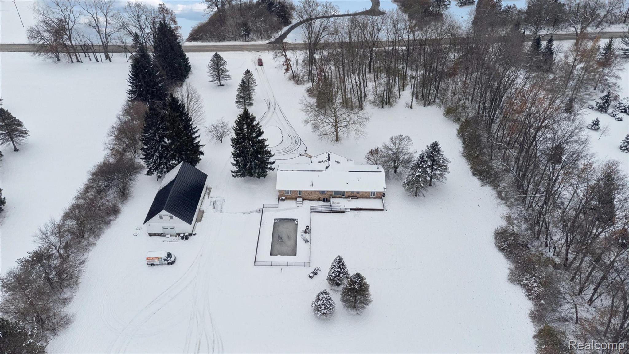 187 Darwin Road Pinckney, MI 48169 - Photo 66 of 71 View of snowy aerial view