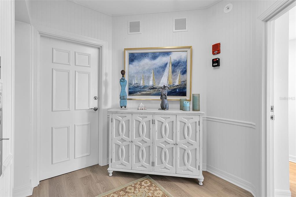 393 North Point Road, Unit 401 Osprey, FL 34229 - Photo 3 of 62 a view of front door with hallway