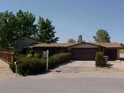 15076 Nokomis Road Apple Valley, CA 92307 - Photo 1 of 1 a view of backyard with seating space