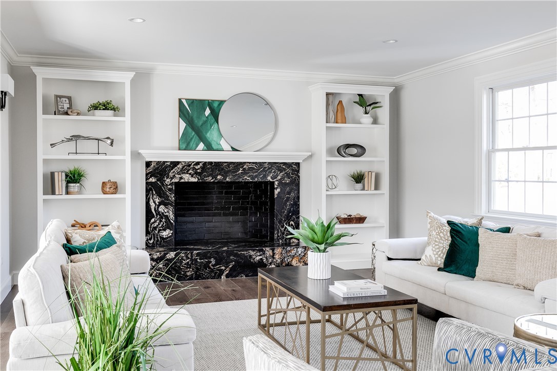 2540 Kentford Road Midlothian, VA 23113 - Photo 23 of 44 Living room with granite hearth and built-in books