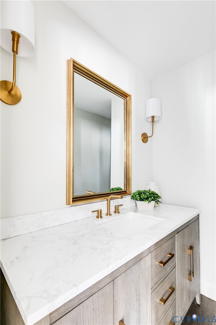 2540 Kentford Road Midlothian, VA 23113 - Photo 26 of 44 a bathroom with a sink and a mirror