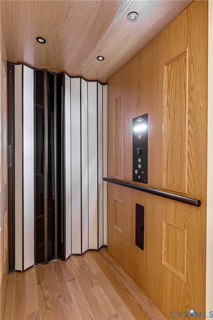 2540 Kentford Road Midlothian, VA 23113 - Photo 42 of 44 a view of a hallway with wooden floor