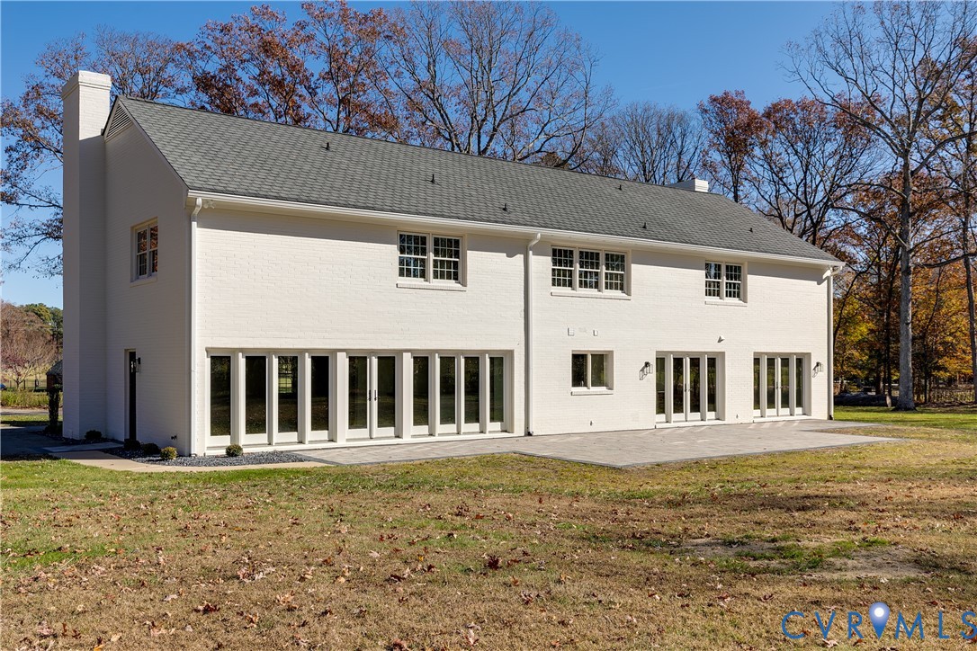 2540 Kentford Road Midlothian, VA 23113 - Photo 43 of 44 Back of house showcasing large windows and patio