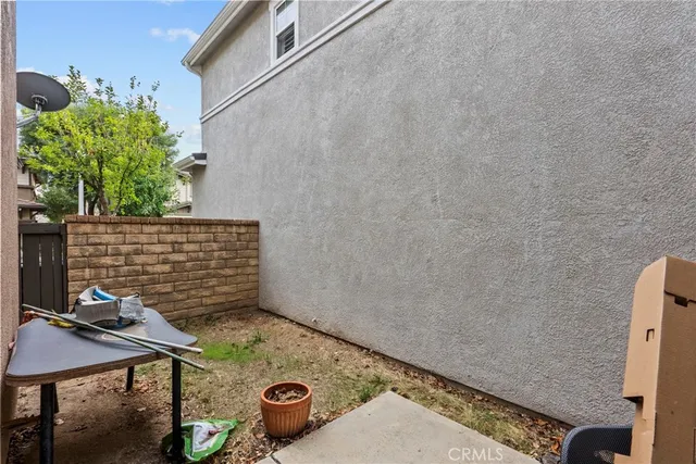 a view of a bench in a patio