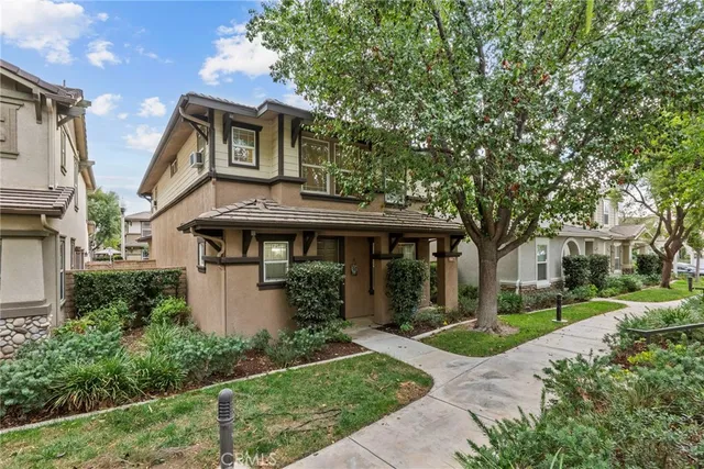 a view of a house with a garden