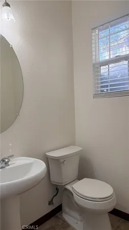 a bathroom with a double vanity sink mirror and double
