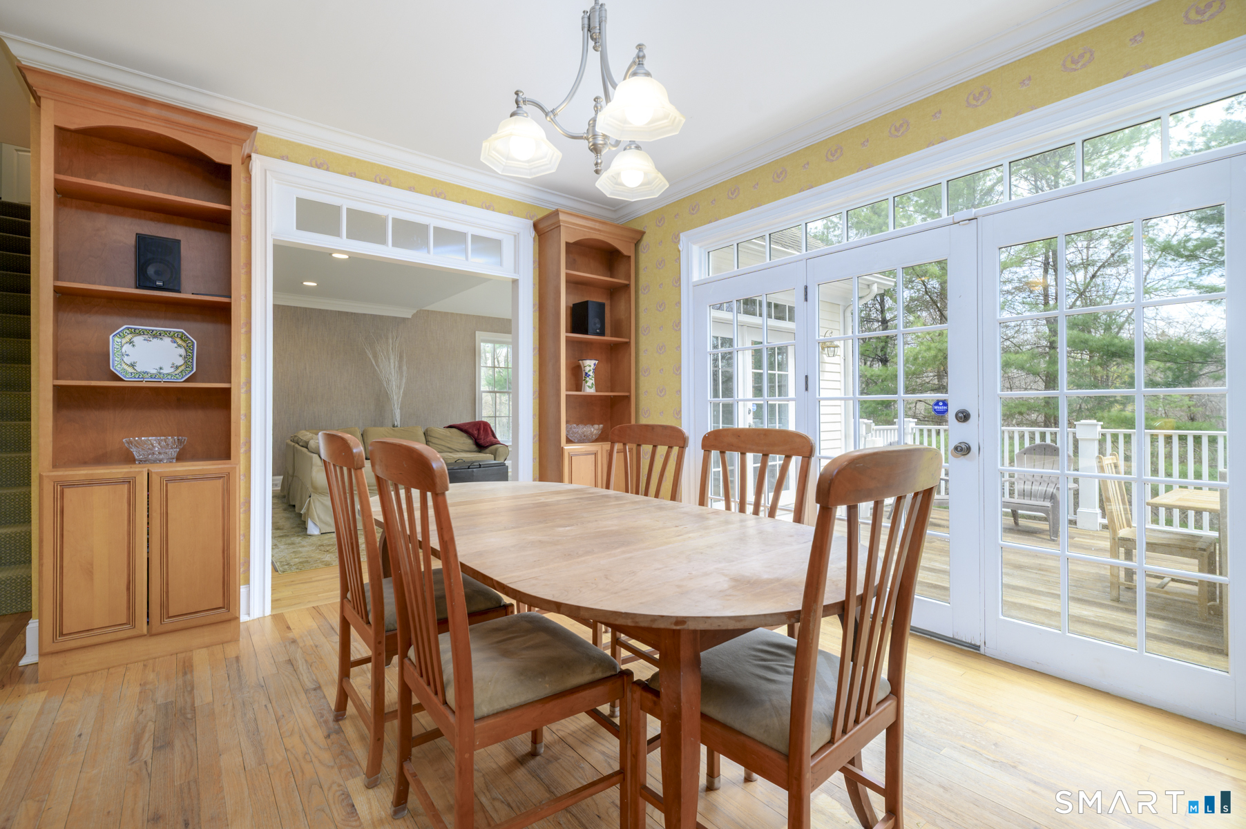 53 Wolfpit Road Wilton, CT 06897 - Photo 12 of 40 a view of a dining room with furniture window and wooden floor