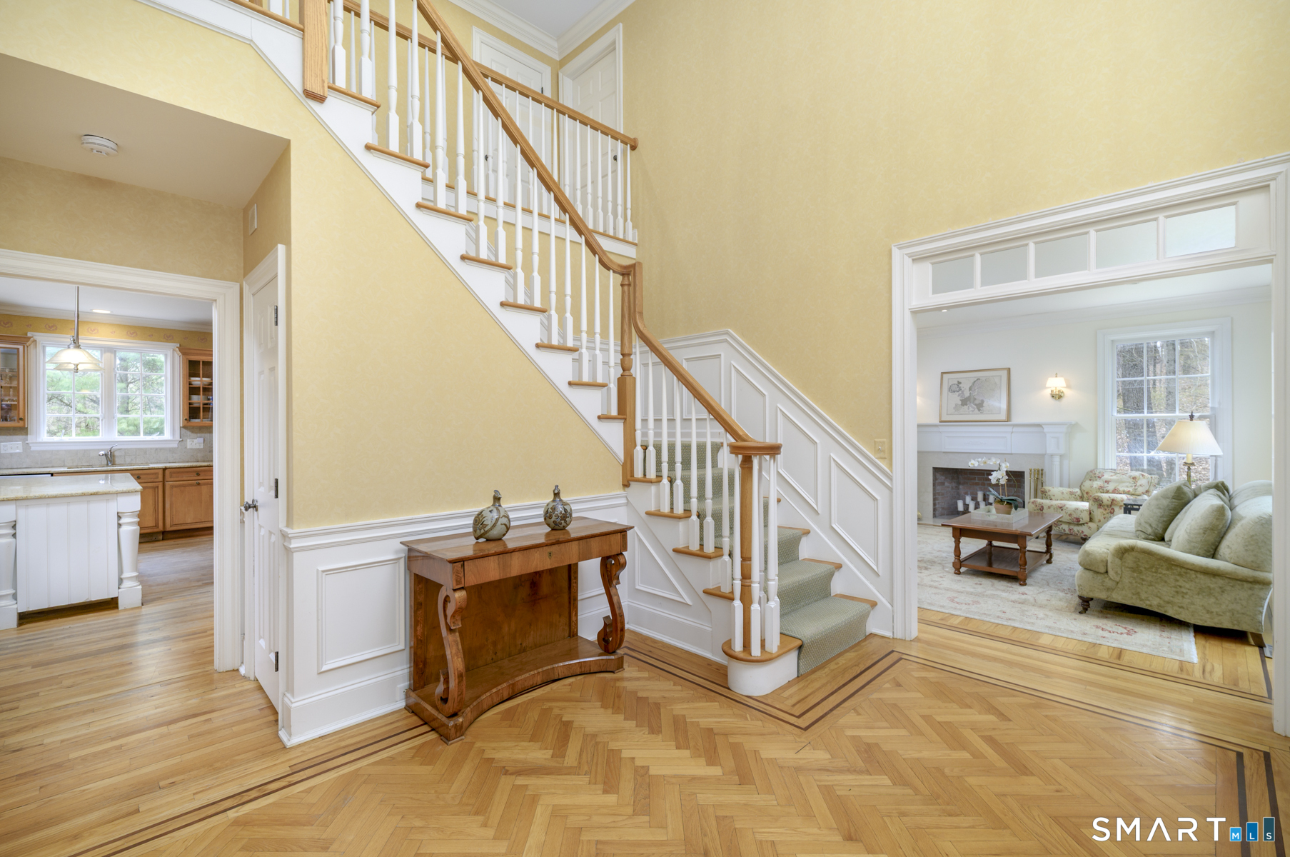 53 Wolfpit Road Wilton, CT 06897 - Photo 2 of 40 a view of livingroom with furniture and staircase