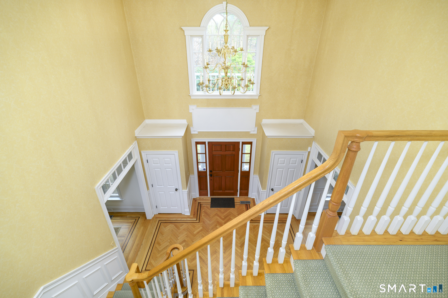 53 Wolfpit Road Wilton, CT 06897 - Photo 21 of 40 a view of staircase with railing and white walls