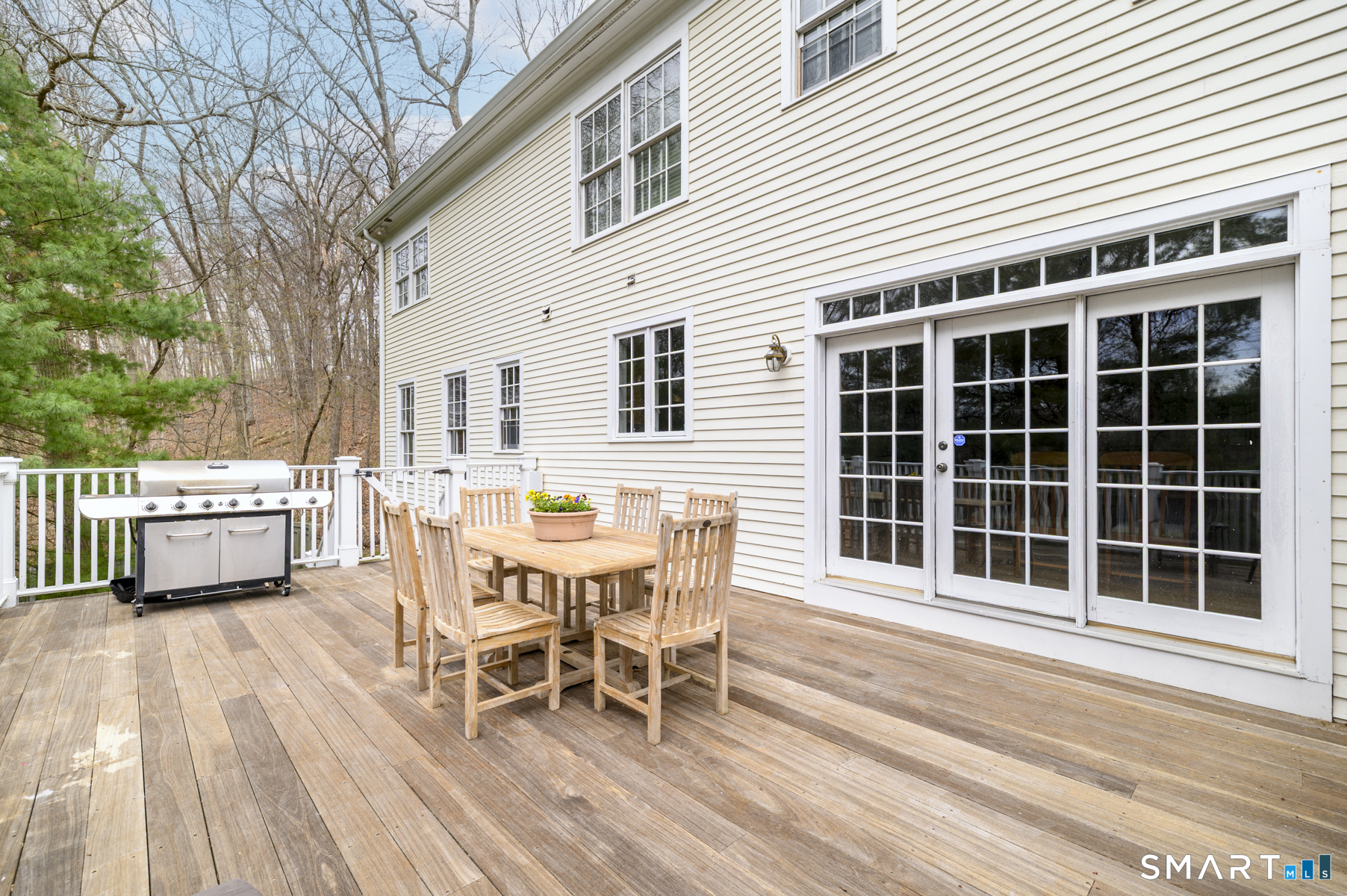 53 Wolfpit Road Wilton, CT 06897 - Photo 35 of 40 a view of a house with a deck