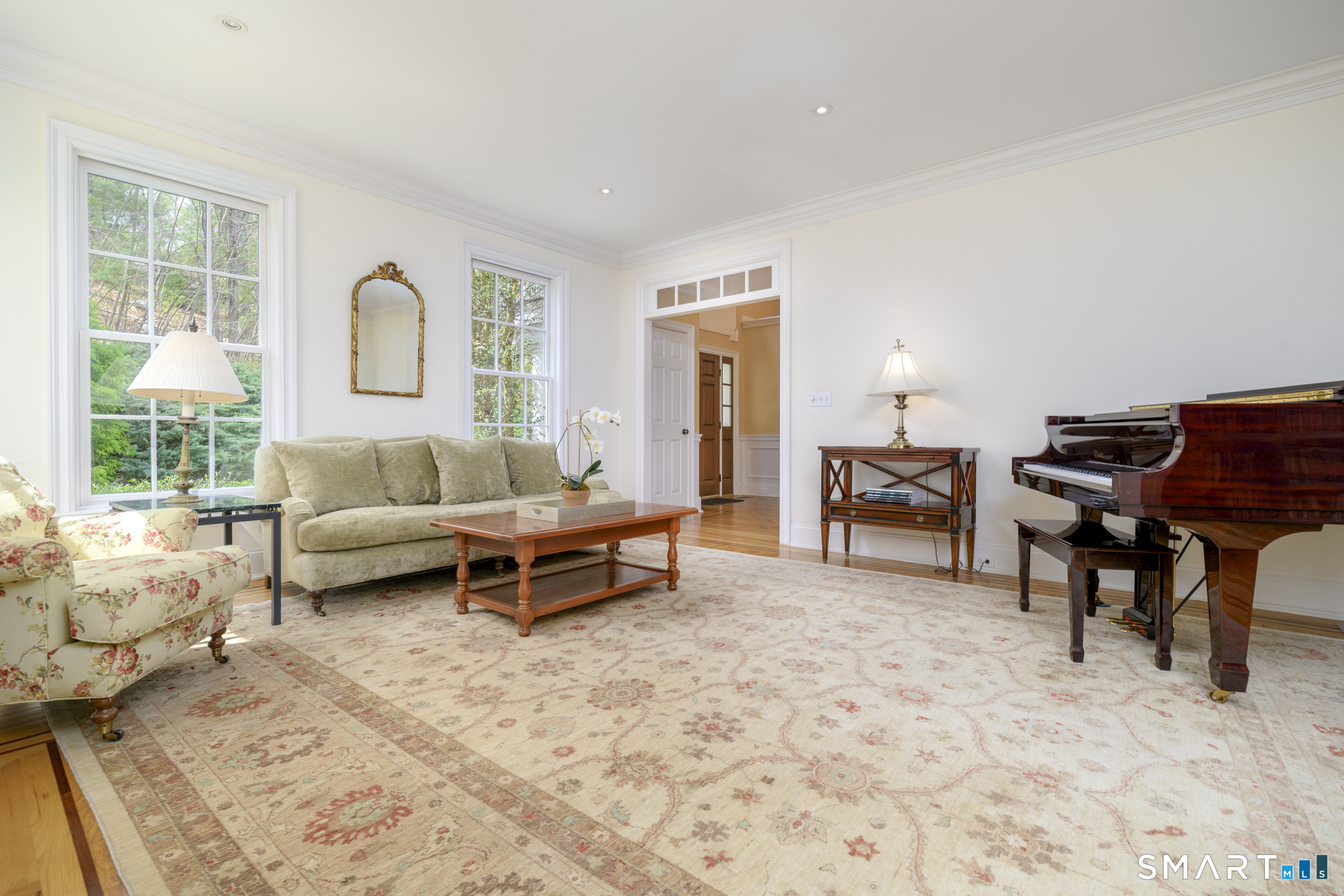 53 Wolfpit Road Wilton, CT 06897 - Photo 4 of 40 a living room with furniture and a large window