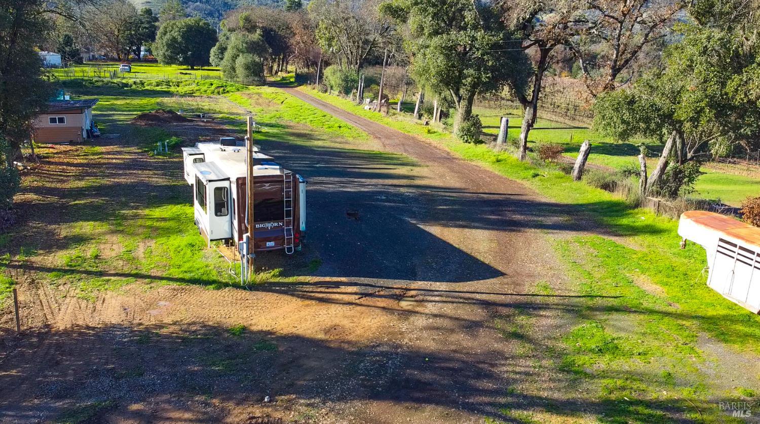 10379 West Road Redwood Valley, CA 95470 - Photo 4 of 14 a view of a yard with an outdoor space