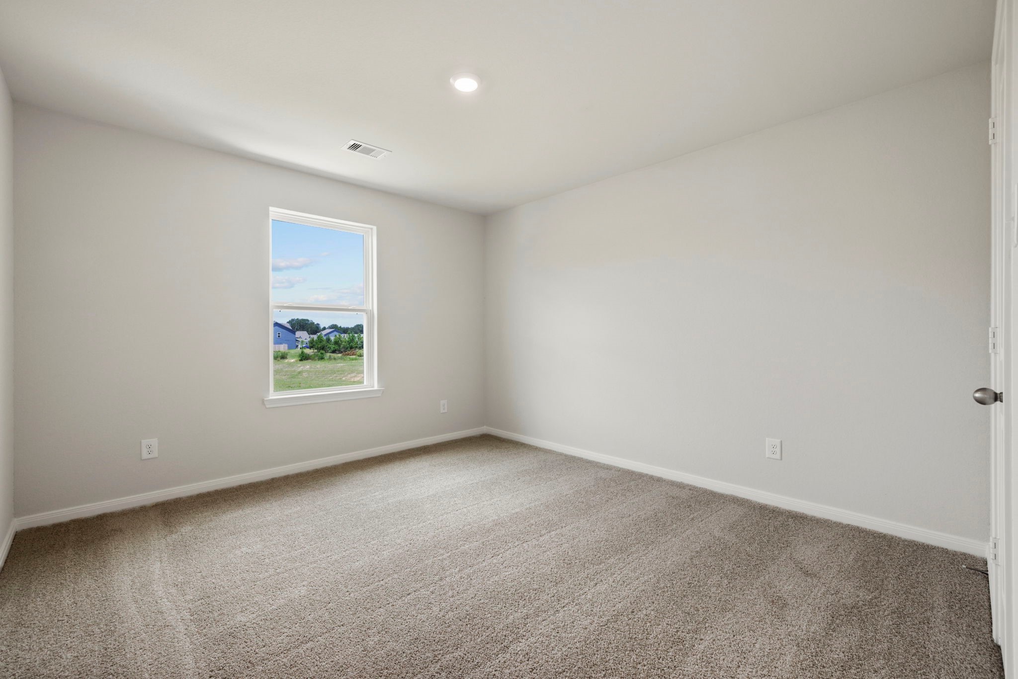 10339 Red Cardinal Drive Cleveland, TX 77328 - Photo 19 of 27 an empty room with windows