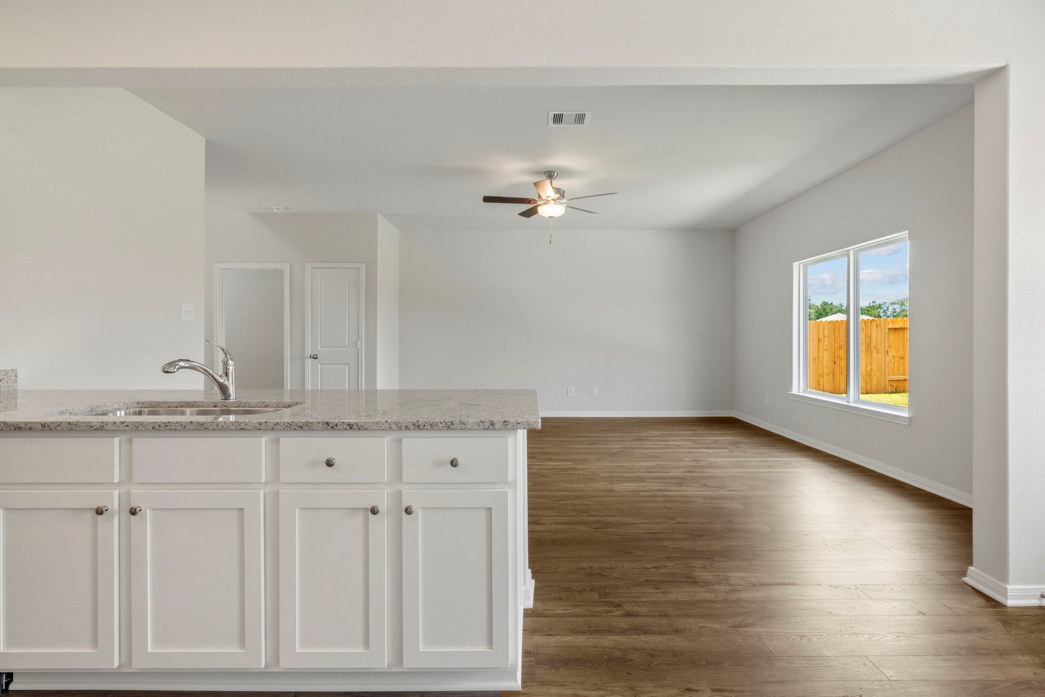 10339 Red Cardinal Drive Cleveland, TX 77328 - Photo 5 of 27 a view of a kitchen with marble kitchen and front door