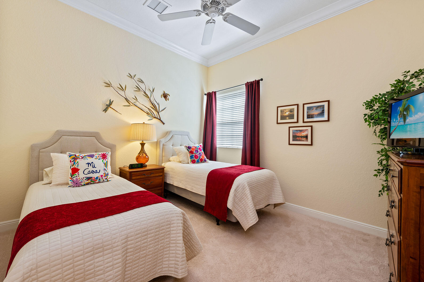 9259 Museo Circle, Unit 203 Naples, FL 34114 - Photo 15 of 46 a bedroom with bed and a chandelier