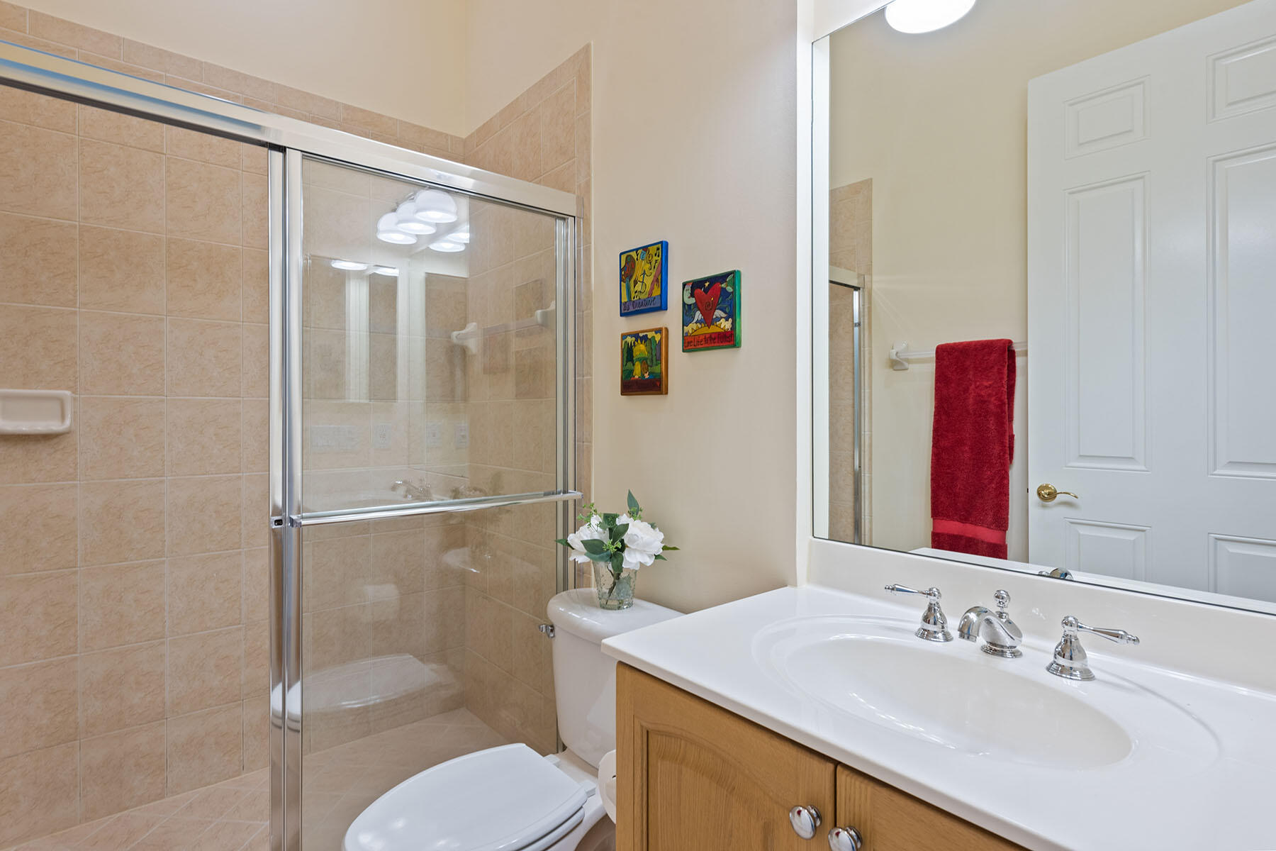 9259 Museo Circle, Unit 203 Naples, FL 34114 - Photo 16 of 46 a bathroom with a sink toilet and shower
