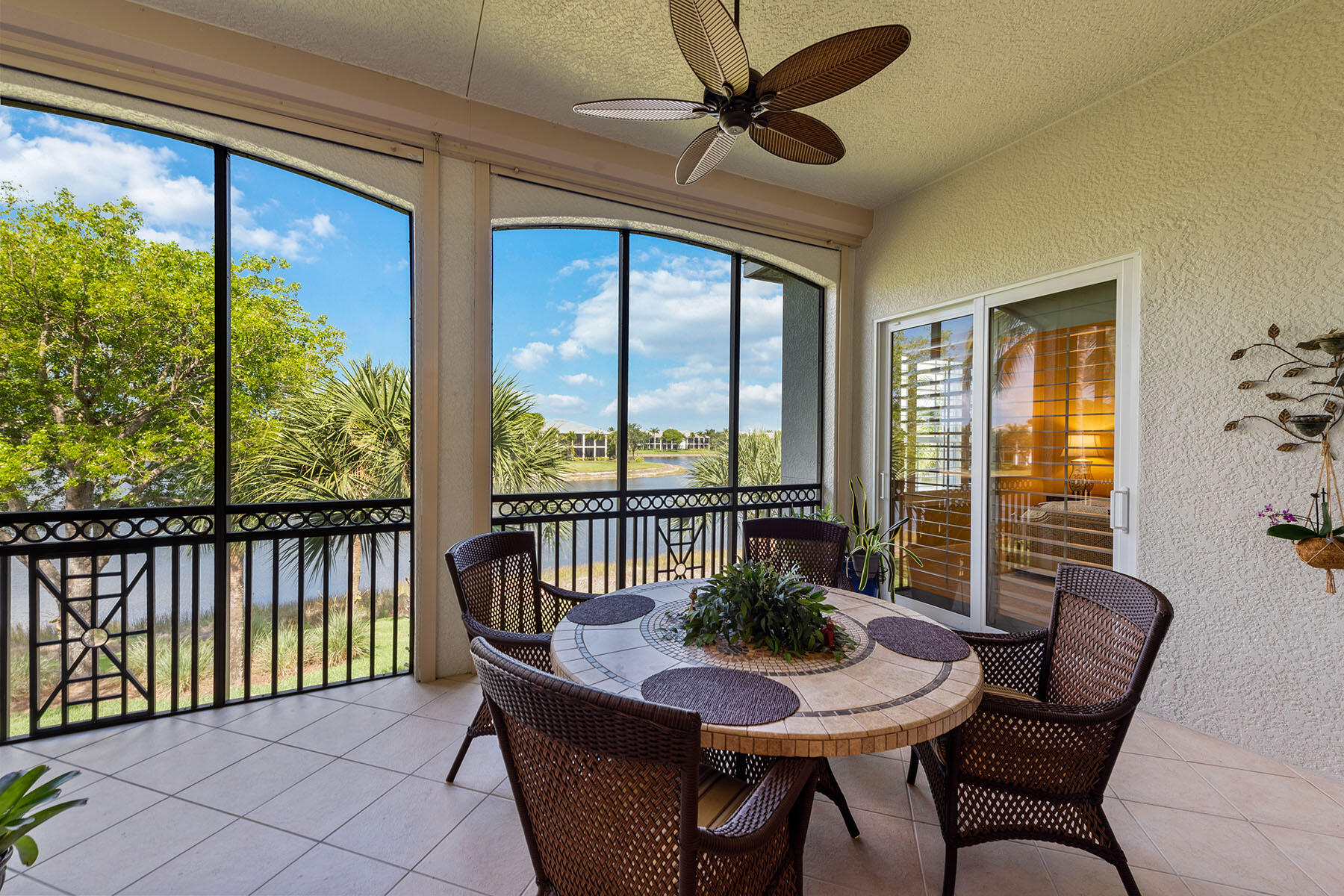 9259 Museo Circle, Unit 203 Naples, FL 34114 - Photo 21 of 46 a view of a dining room with furniture window and outside view