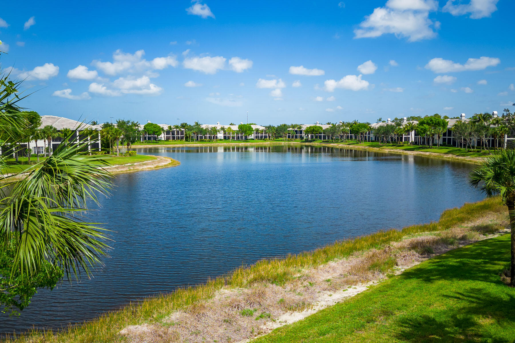 9259 Museo Circle, Unit 203 Naples, FL 34114 - Photo 23 of 46 a view of a lake