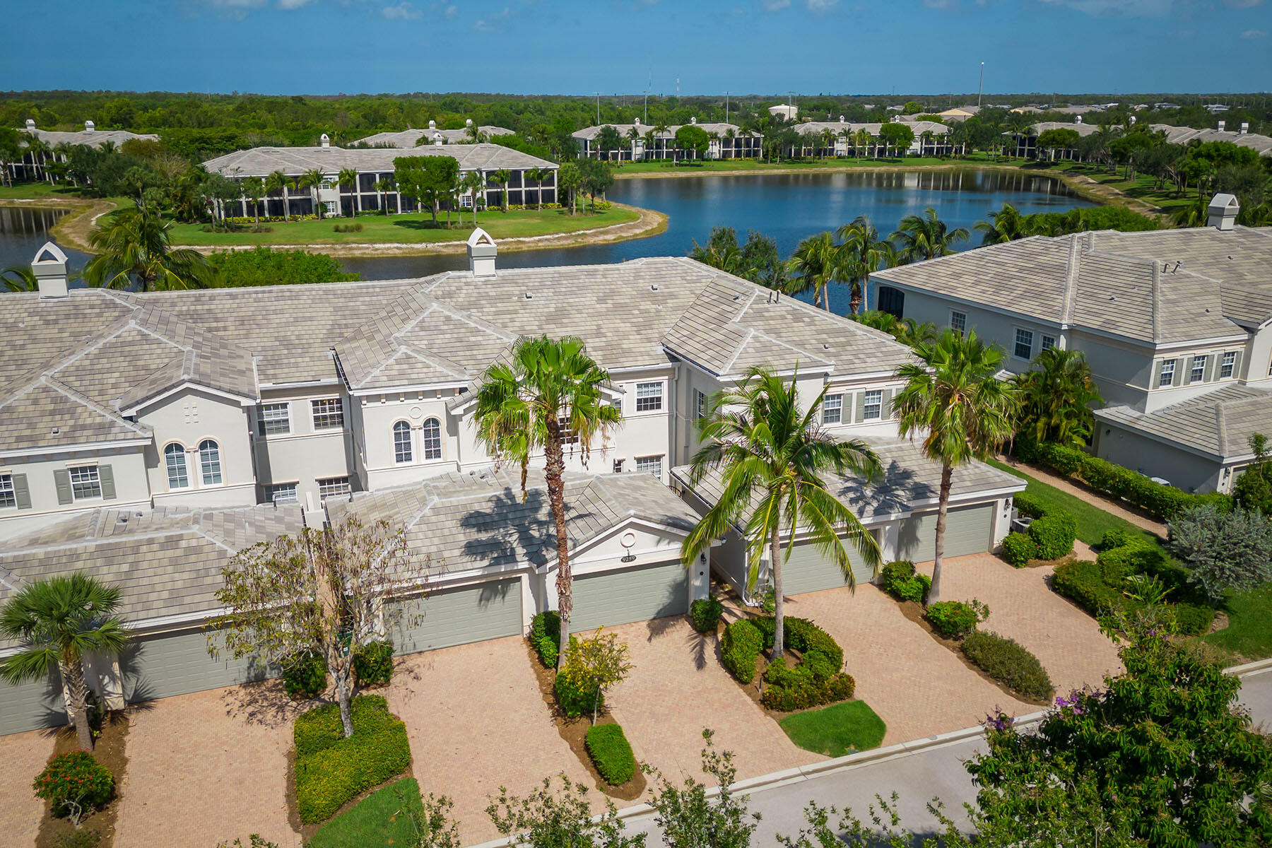 9259 Museo Circle, Unit 203 Naples, FL 34114 - Photo 29 of 46 an aerial view of residential house with outdoor space and lake view