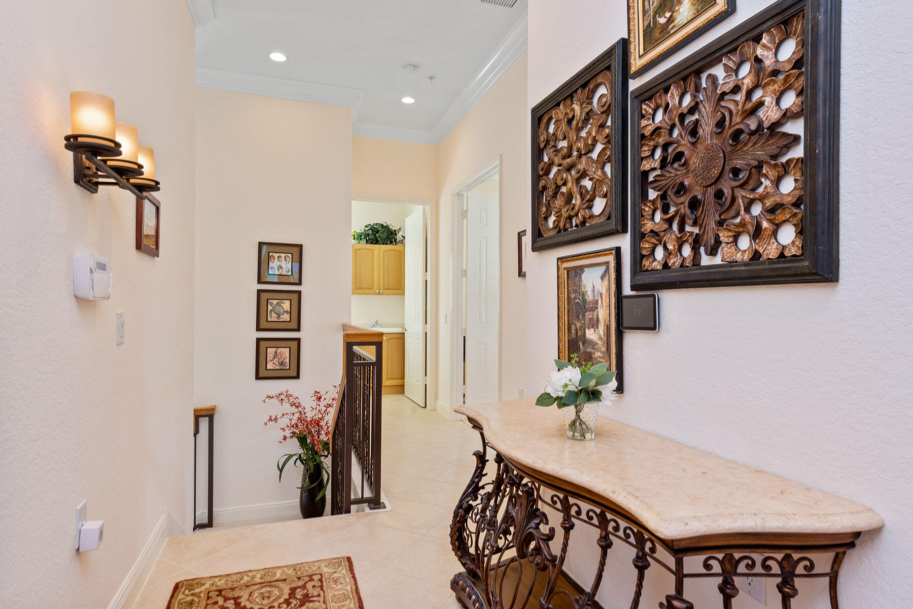 9259 Museo Circle, Unit 203 Naples, FL 34114 - Photo 10 of 46 a view of a hallway with furniture and front door