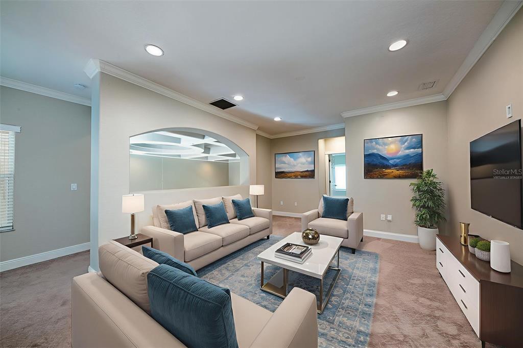 5331 Vista Club Run Sanford, FL 32771 - Photo 27 of 53 a living room with furniture and a flat screen tv