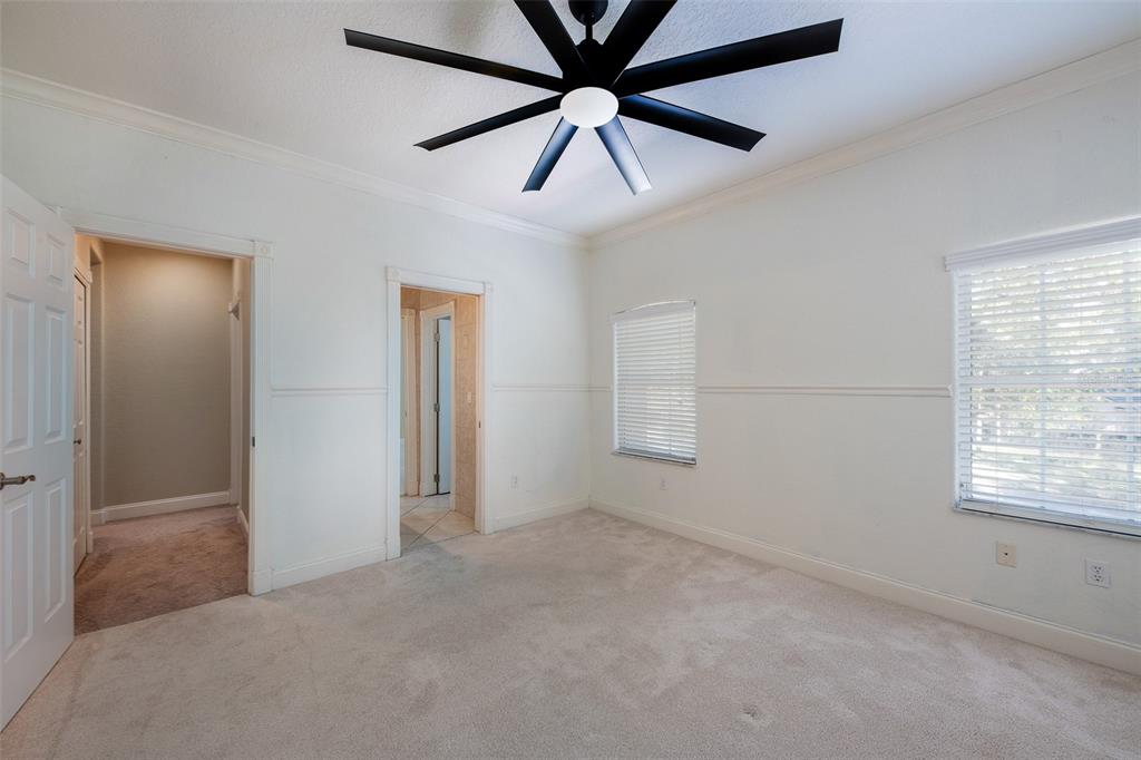 5331 Vista Club Run Sanford, FL 32771 - Photo 30 of 53 an empty room with windows and fan