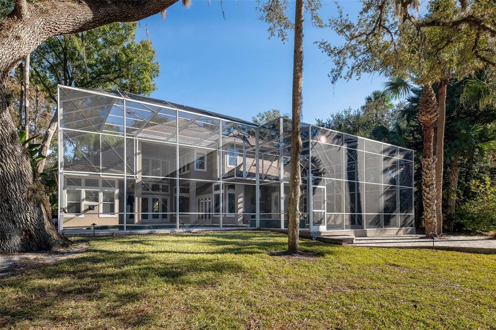 5331 Vista Club Run Sanford, FL 32771 - Photo 4 of 53 a view of a house with swimming pool and porch