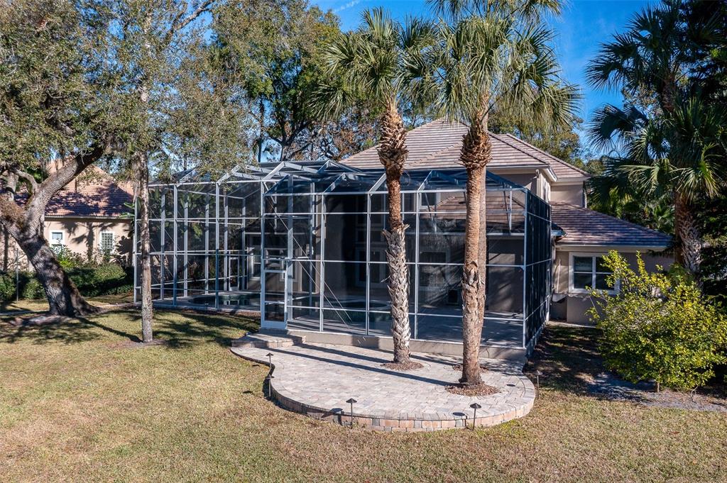 5331 Vista Club Run Sanford, FL 32771 - Photo 46 of 53 a front view of a house with a garden