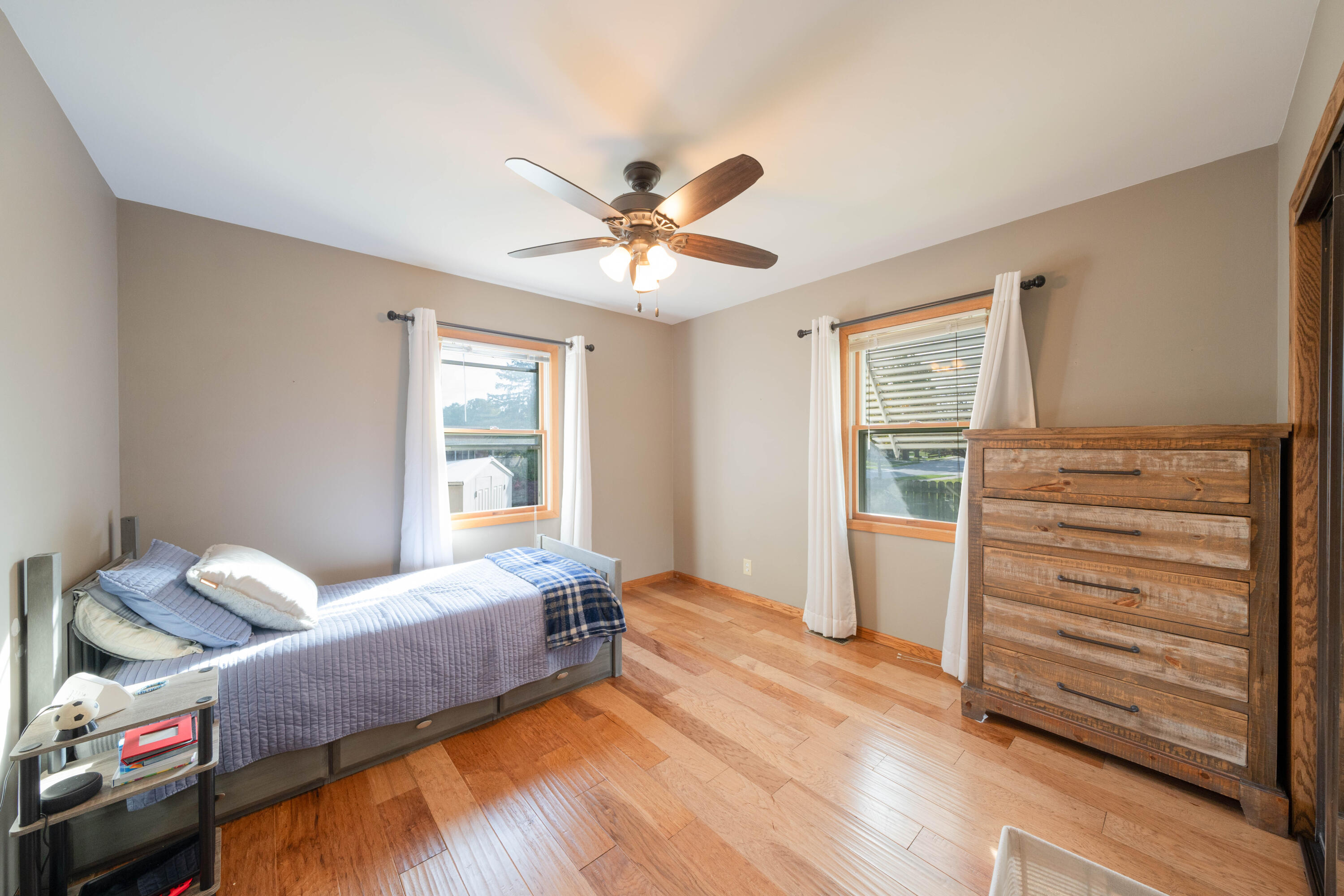 3550 Wirth Road Highland, IN 46322 - Photo 8 of 15 a bedroom with a bed and wooden floor