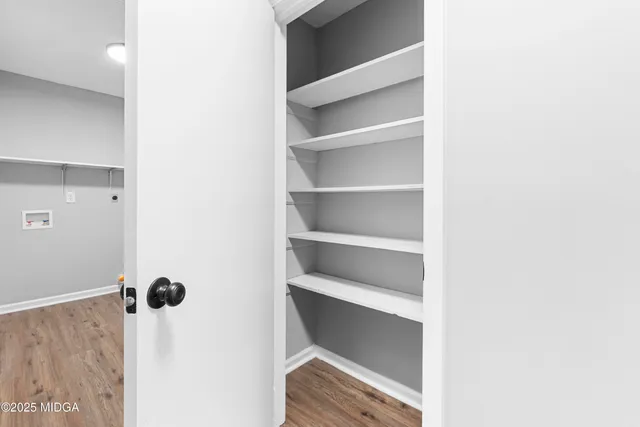 a view of an empty walk in closet