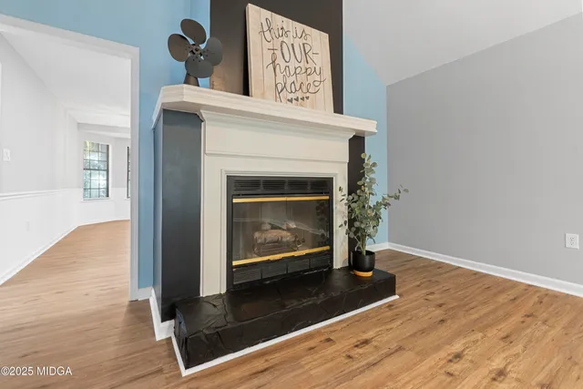 a living room with a fireplace