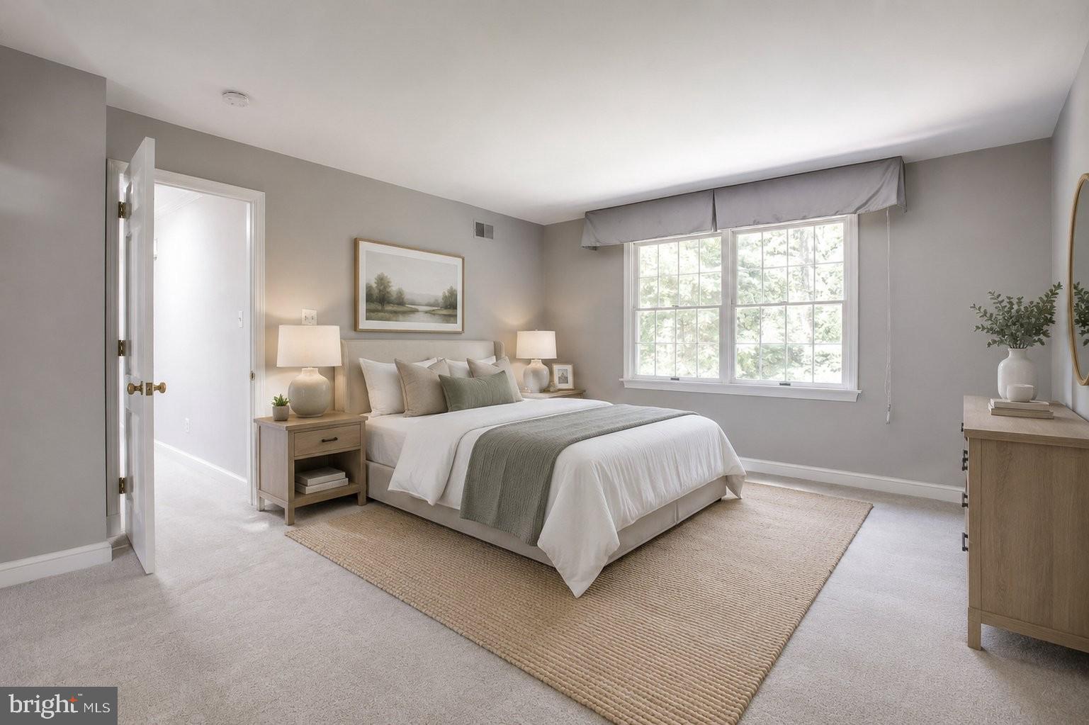 8500 Brook Road McLean, VA 22102 - Photo 30 of 59 a bedroom with a large bed and a window